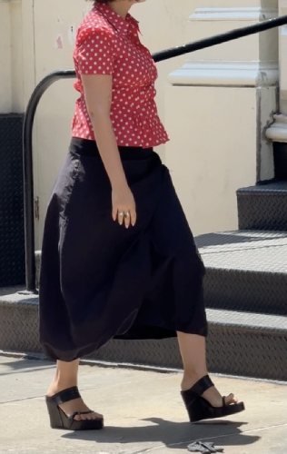 red and white polka-dot button-down shirt