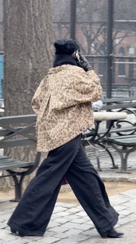 cheetah jacket with washed black baggy jeans and a chunky black scarf