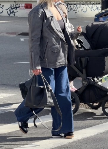 blazer and a top-handle bag