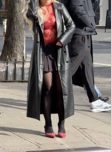 black micro skirt and a leather black trench