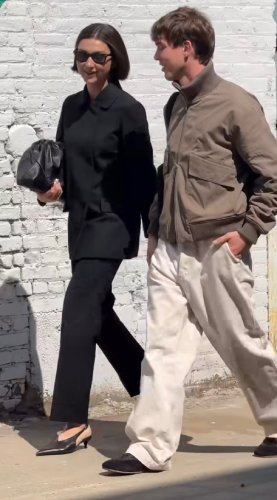 collared coat and tailored trousers