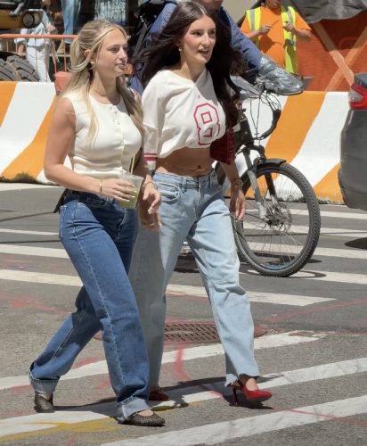 light-wash jeans with a white t-shirt and red heels