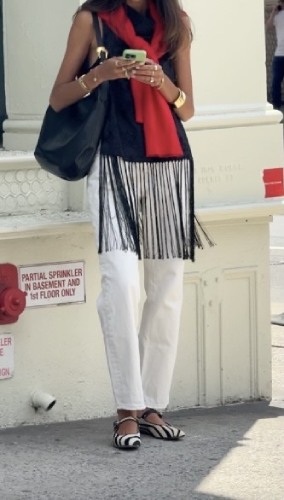 zebra-print ballet flats and an apple red sweater