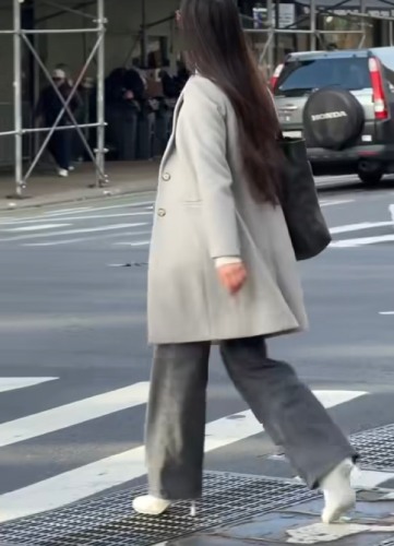 mid-cut trench coat with grey heeled sneakers