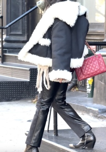 leather and white fur coat