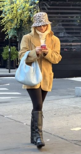 white turtleneck sweater with a suede blazer