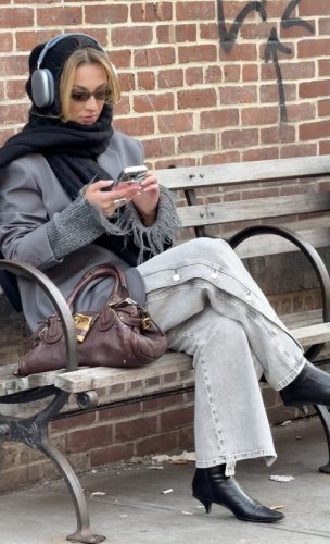 grey-wash jeans and a sleek grey blazer
