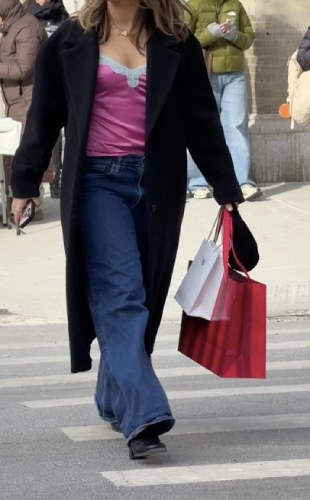 black trench coat and dark-wash jeans