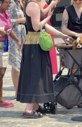 black skirt featuring block patterns paired with a fitted black tank