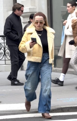 dark brown shirt paired with pointed brown boots