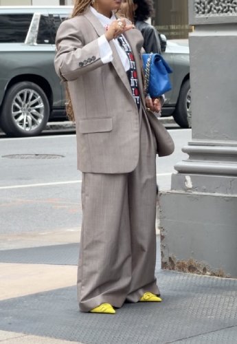 oversized taupe blazer paired with matching trousers