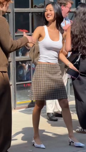 plaid midi skirt paired with a crisp white tank